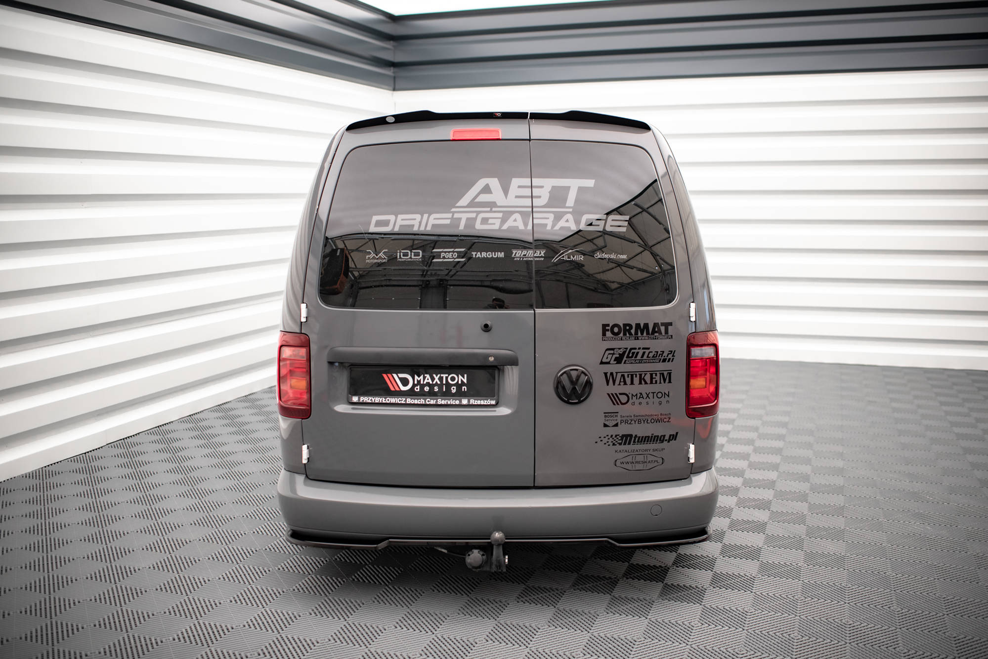 Street+ Mittlerer Diffusor Heck Ansatz passend für VW Caddy Long Mk3 FL schwarz Hochglanz